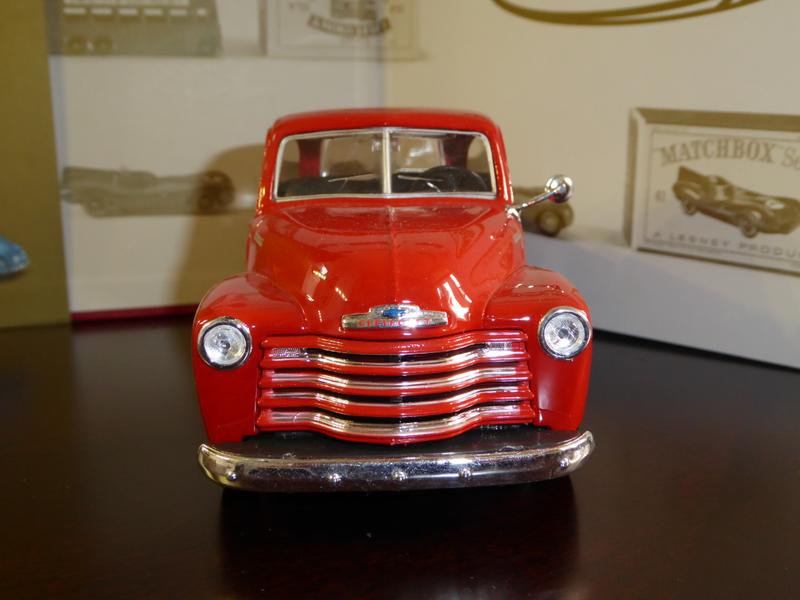 The headlights, front grill, Chevrolet emblem and bumper are separate parts. Has one side mirror. Windshield has silver paint to simulate chrome trim. Wipers molded on the windshield instead of separate parts. Hood is molded with the body and does not open.